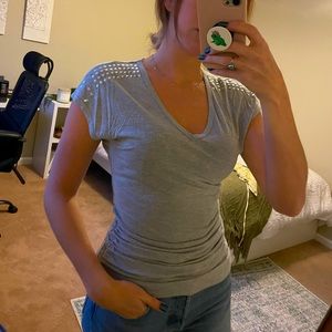 Gray tunic style shirt sleeve shirt with embellished shoulders